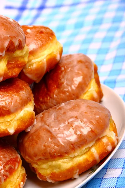 Delicious dessert made of several glazed donuts — Stock Photo, Image