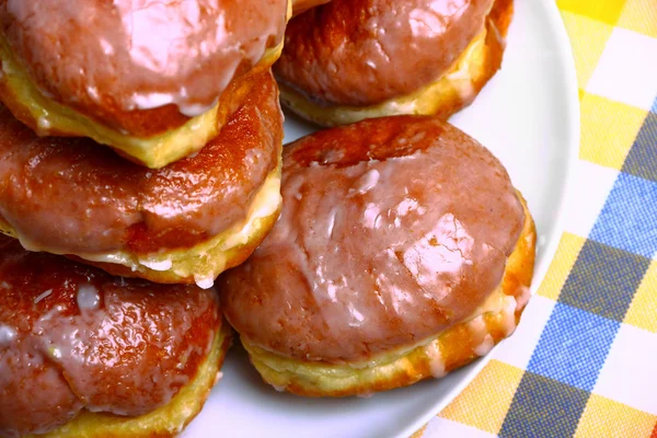 Delicious dessert made of several glazed donuts — Stock Photo, Image
