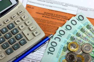 The tax form with calculator, money and pen clipart