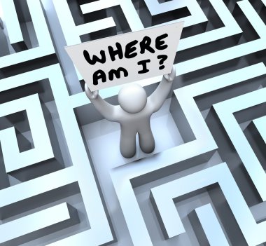 Where Am I Person Holding Sign Lost in Maze clipart