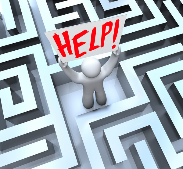 Person in Labyrinth Maze Holding Help Sign