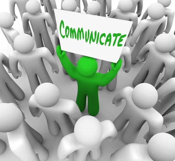Comunicar pessoa detém sinal Obter a atenção da multidão — Fotografia de Stock