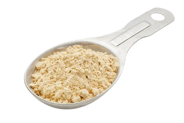Maca root powder on tablespoon — Stock Photo, Image