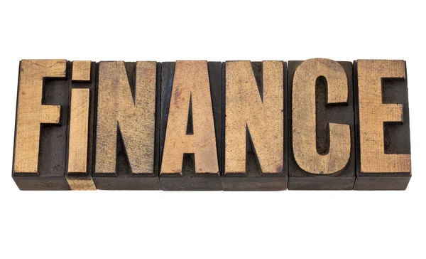 Slovo finance v dřeva typu — Stock fotografie