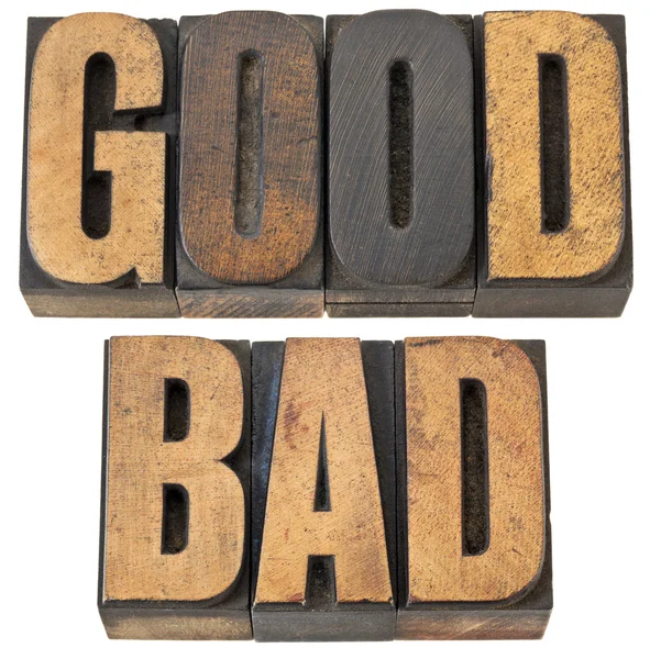 Gutes und schlechtes Wort in Holzart — Stockfoto