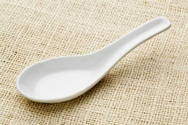 Empty ceramic asian spoon — Stock Photo, Image