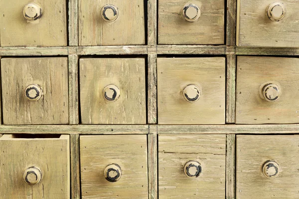 Primitive apothecary drawer cabinet — Stock Photo, Image