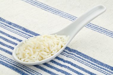 Spoon of cooked rice clipart