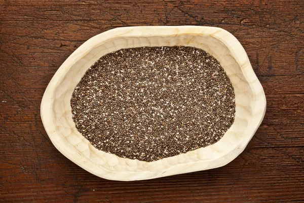 Chia seeds in a rustic bowl — Stock Photo, Image