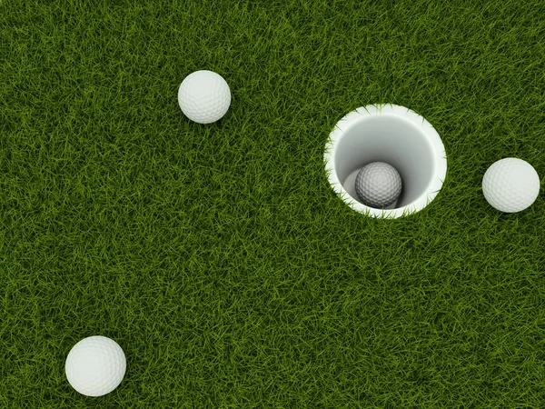 구멍 안에 있는 골프 공 — 스톡 사진
