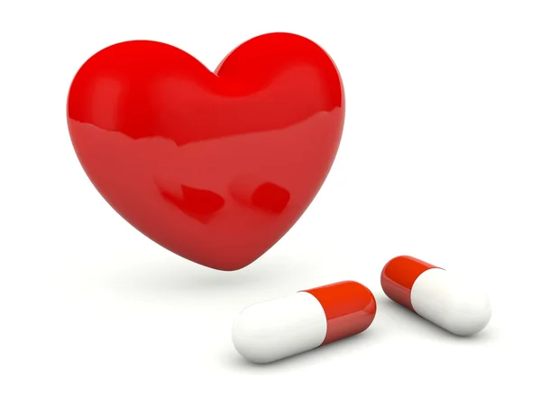 A tabletták elszigetelt fehér szív — Stock Fotó