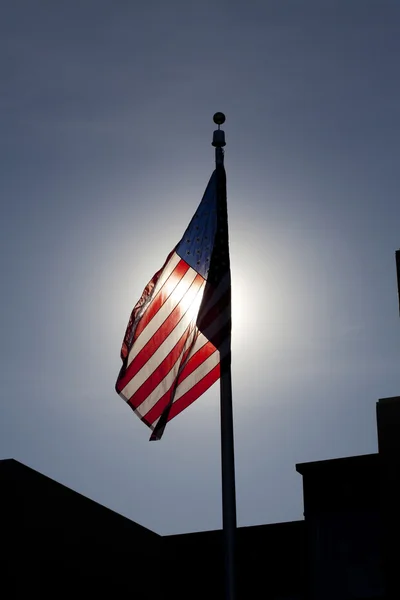 US Flag Backlit with Sun Shining Through — Stock Photo, Image