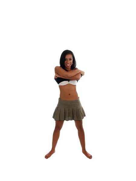 Skinny young black woman smiling taking off shirt — Stock Photo, Image