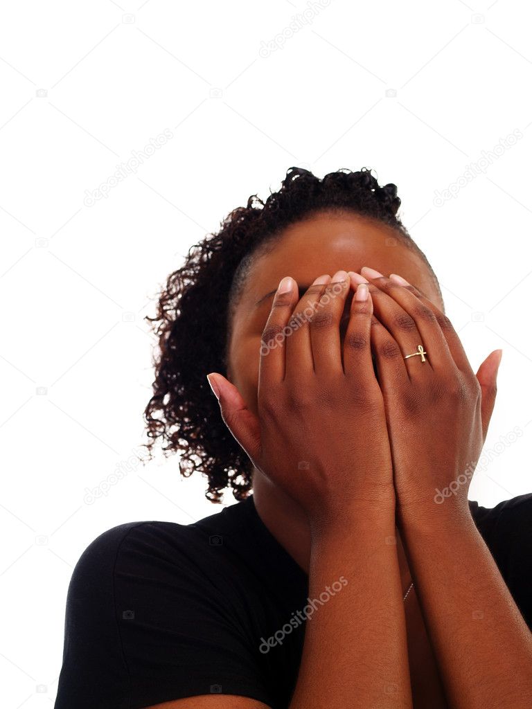 Young African American Woman hands covering face