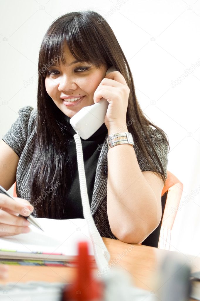 Pretty secretary on the phone