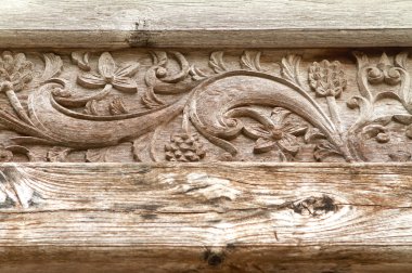 Antique asian javanese wood carving clipart