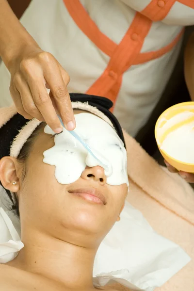 Facial treatment with mask cream — Stock Photo, Image