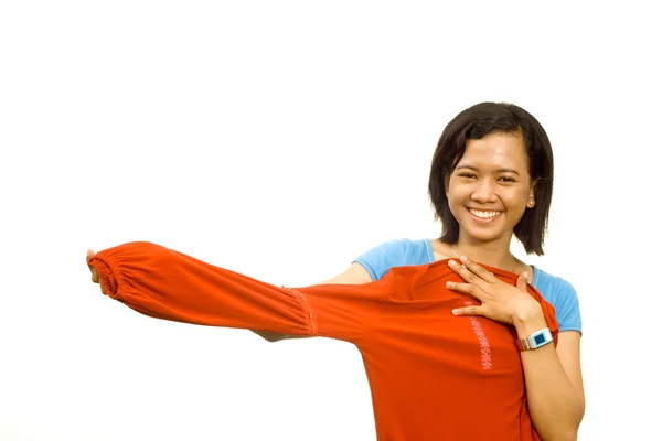 Happy ethnic girl fitting an outfit — Stock Photo, Image