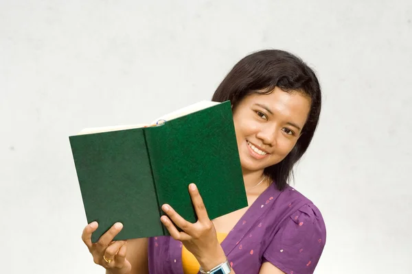 Asian college student with book — Stock Photo, Image