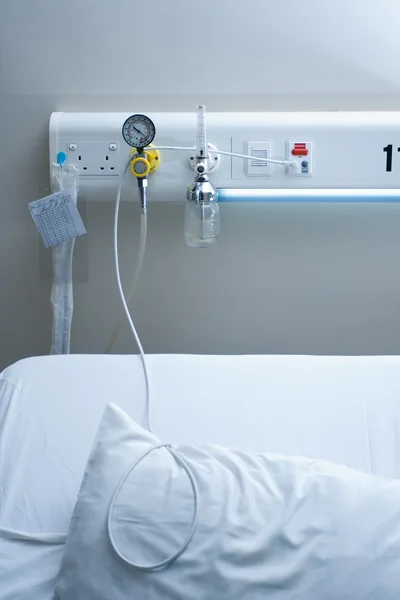 Inpatient bed in hospital ward — Stock Photo, Image