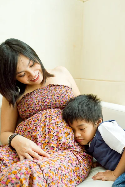 Asian ethnic pregnant mother and son — Stock Photo, Image