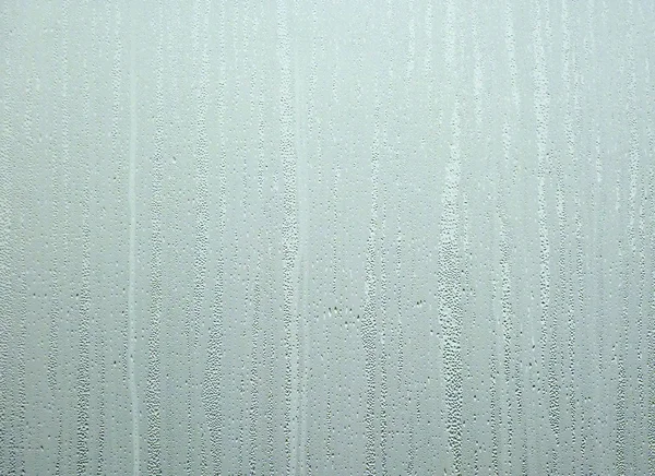 Wassermuster am Fenster — Stockfoto