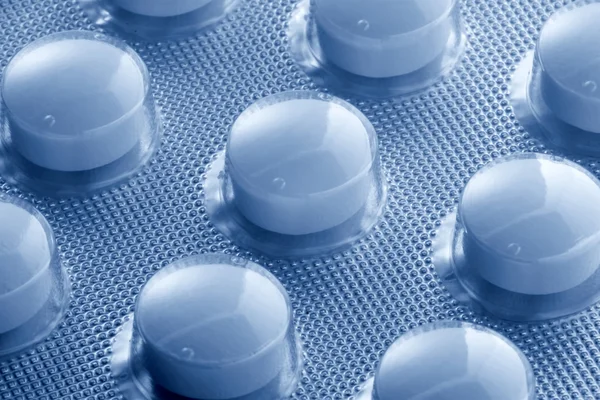 Fólie zabalené tablety — Stock fotografie