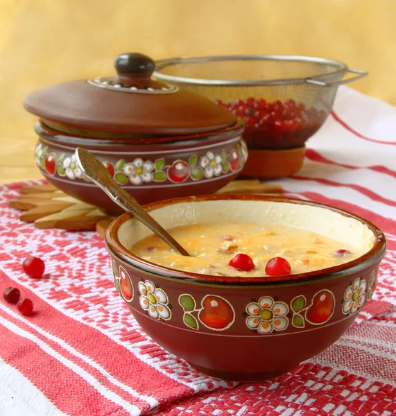 Corn porridge (banish) with a cranberry — Stock Photo, Image