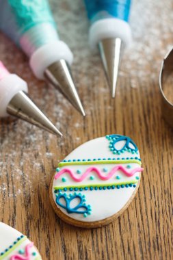 Decorating Easter cookies clipart