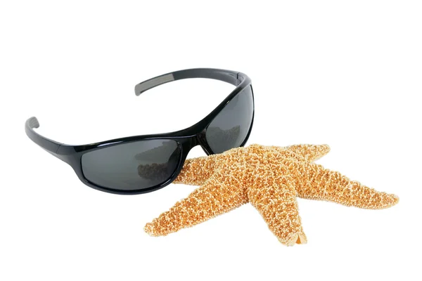 Óculos de sol e estrelas do mar — Fotografia de Stock