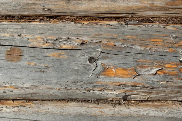 Um fragmento de uma parede de madeira — Fotografia de Stock