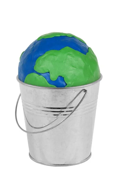 Globe in a metal bucket — Stock Photo, Image