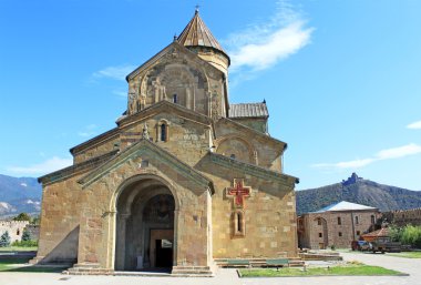 Svetitskhoveli Cathedral in Mtskheta and Jvari monestery behind, Georgia clipart