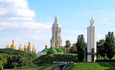 Kiev-Pechersk Lavra monastery and Memorial to sacrifice of famine in Kiev. clipart