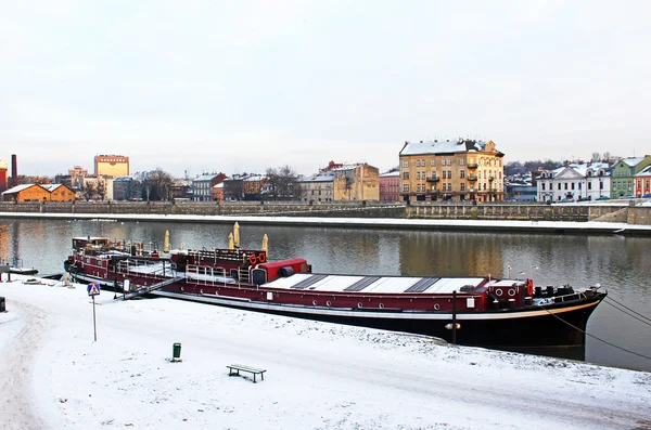 Vistula and red pleasure boat in Krakow, Poland — Stock Photo, Image