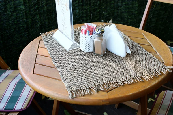 Table in the outdoor summer cafe — Stock Photo, Image