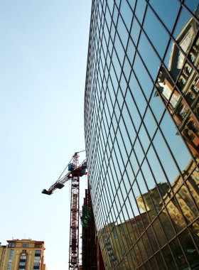 Reflection on facade of high-tech style building