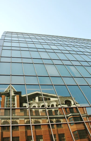 Reflection on facade of high-tech style building — Stok fotoğraf