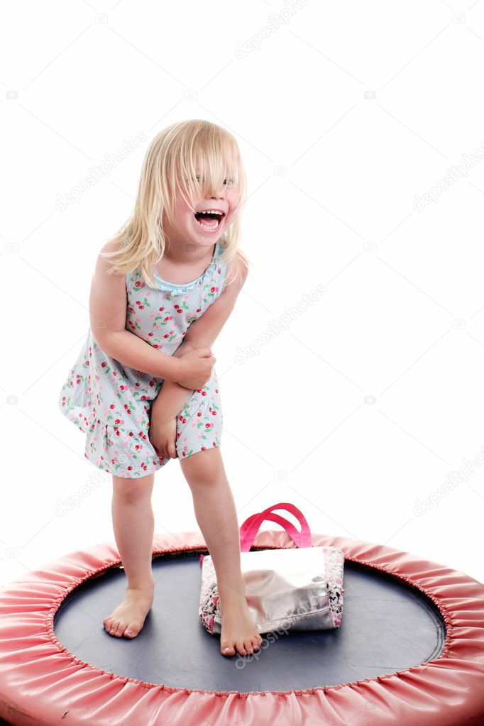 Cute little girl on a trampoline