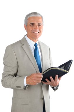 Mature Businessman with Open Binder clipart