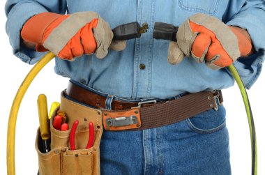 Workman Plugging in Extension Cords clipart