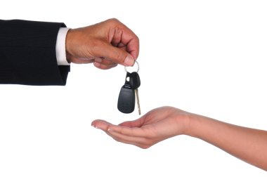 Salesman giving keys to woman clipart