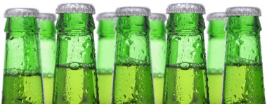 Closeup of beer bottles clipart