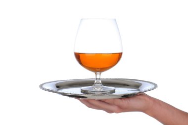 Brandy Snifter on tray held by womams hand clipart