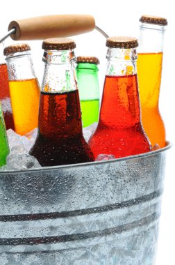 Closeup of Soda Bottles in Bucket clipart