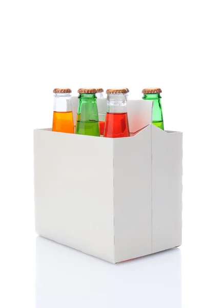 Šest pack rozmanité soda láhve — Stock fotografie