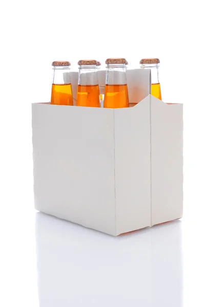 Seis pacotes de garrafas de refrigerante laranja — Fotografia de Stock