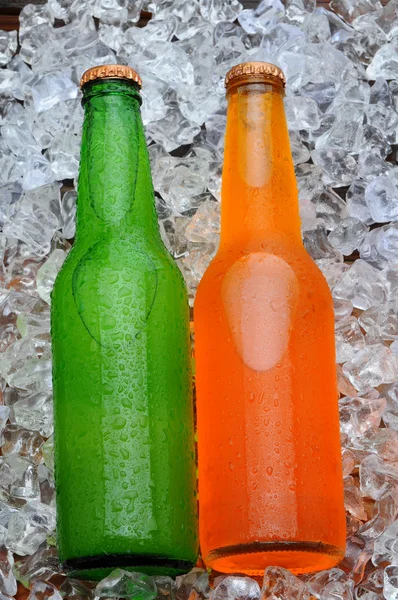 Two Soda Bottles on a Bed of Ice — Stock Photo, Image