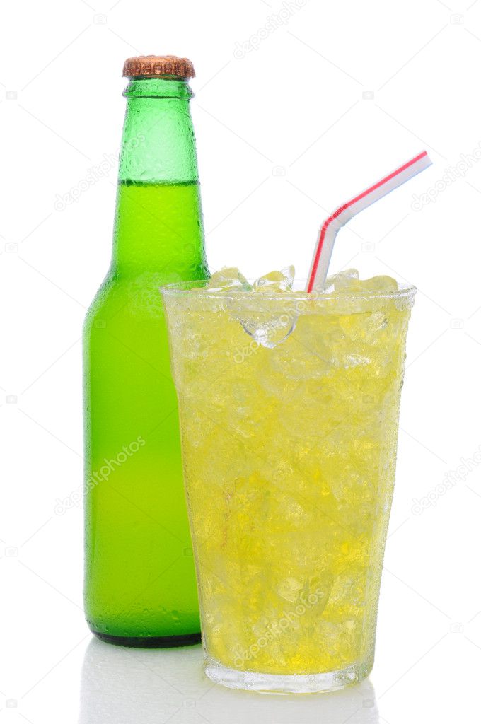 Glass of Lemon Lime Soda with Drinking Straw and Bottle