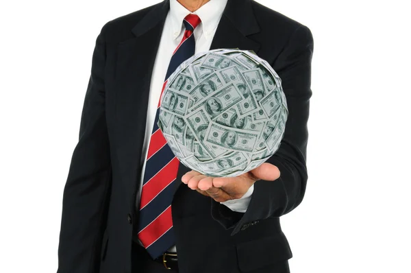 Homme d'affaires tenant une grosse boule d'argent — Photo